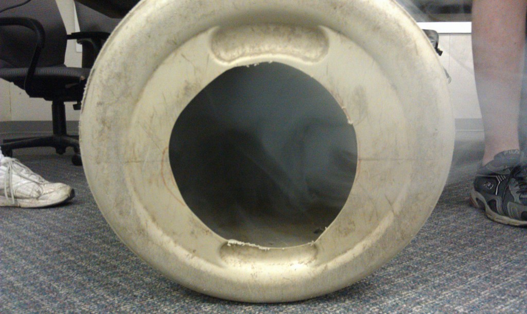 Hole in the bottom of the garbage can. 